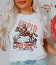 Load image into Gallery viewer, Cupid Find Me a Cowboy T Shirt
